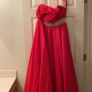Beautiful Evening red ball gown. Lovely with jewels around the waist.